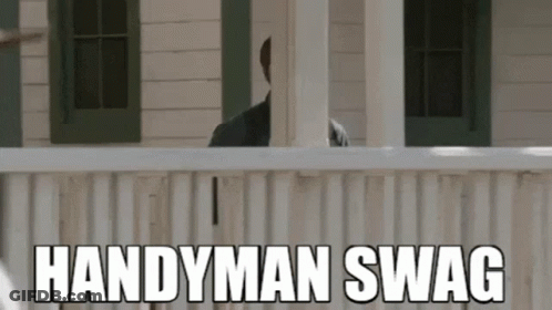 A Man Is Standing On A Porch With The Words `` Handyman Swag '' Written In White Letters . GIF