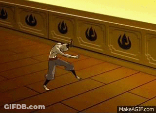 A Man Is Standing On A Wooden Floor In A Room . GIF