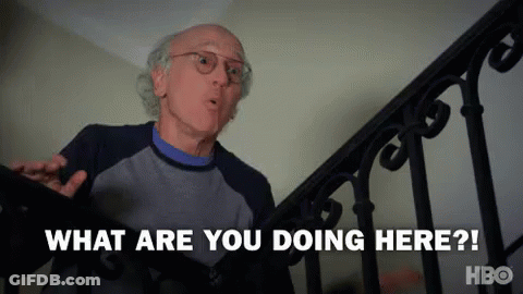 A Man Is Standing On Top Of A Set Of Stairs And Asking What Are You Doing Here ? GIF