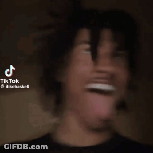 A Man Is Sticking His Tongue Out In A Tik Tok GIF
