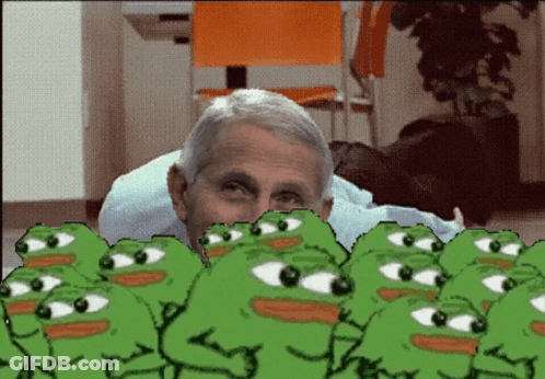 A Man Is Surrounded By Green Frogs With Big Eyes GIF