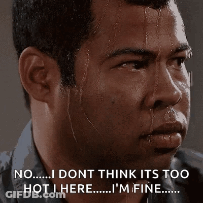 A Man Is Sweating And Says No I Dont Think Its Too Hot I Here I 'M Fine . GIF
