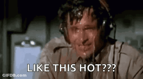 A Man Is Sweating While Wearing Headphones And Says `` Like This Hot ? '' GIF