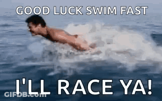 Swimmer In Ocean With Good Luck Race Text GIF