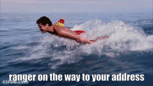 A Man Is Swimming In The Ocean With The Words " Ranger On The Way To Your Address " Above Him GIF