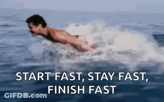 A Man Is Swimming In The Ocean With The Words `` Start Fast , Stay Fast , Finish Fast '' . GIF
