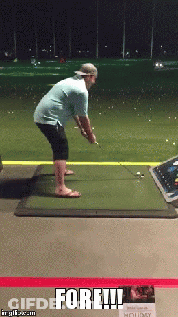 A Man Is Swinging A Golf Club At A Golf Ball And The Caption Says Fore !!! GIF