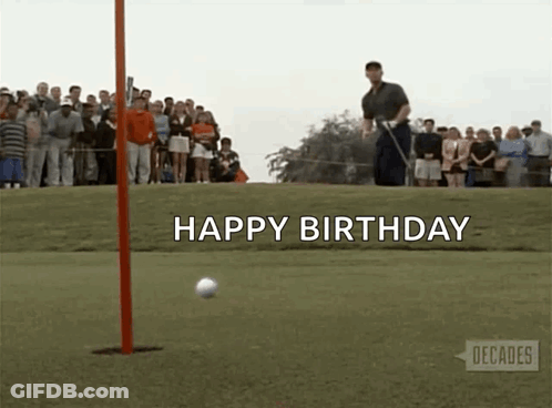 A Man Is Swinging A Golf Club At A Golf Ball On A Golf Course With The Words Happy Birthday Behind Him GIF