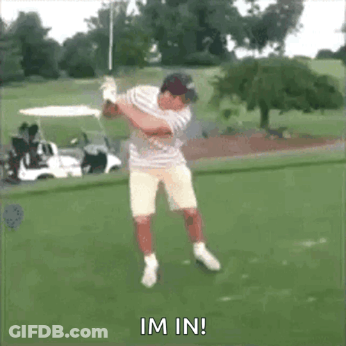 A Man Is Swinging A Golf Club On A Golf Course And The Words Im In Are Visible GIF