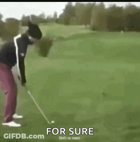 A Man Is Swinging A Golf Club On A Golf Course With The Words For Sure Written Below Him . GIF