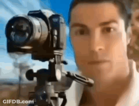 Man Taking Photo With Camera GIF