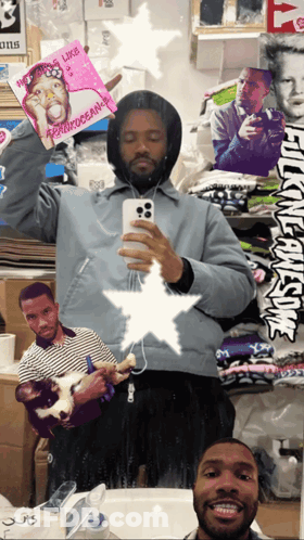 A Man Is Taking A Selfie In Front Of A Wall That Has Stickers On It Including One That Says Nothing Like Frank Ocean GIF