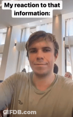 A Man Is Taking A Selfie With A Caption That Says " My Reaction To That Information " GIF