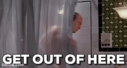 A Man Is Taking A Shower In A Bathroom With The Words `` Get Out Of Here '' Written Above Him . GIF