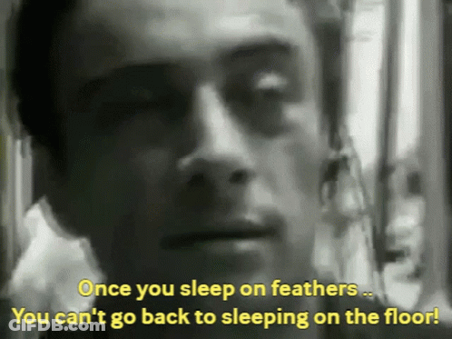 A Man Is Talking About Sleeping On The Floor GIF