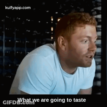 A Man Is Talking About What He Is Going To Taste . GIF