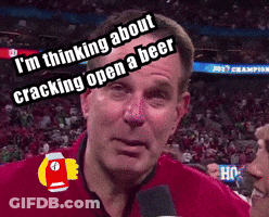 A Man Is Talking Into A Microphone And Says " I 'M Thinking About Cracking Open A Beer " .. GIF