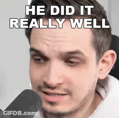 A Man Is Talking Into A Microphone With The Words He Did It Really Well Written On His Face . GIF