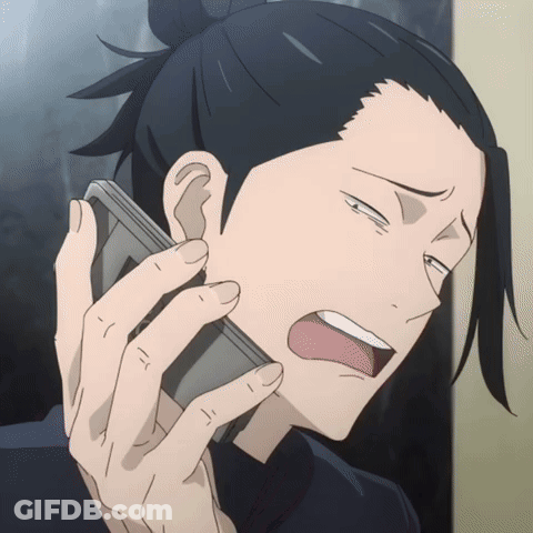 A Man Is Talking On A Cell Phone And Making A Funny Face GIF
