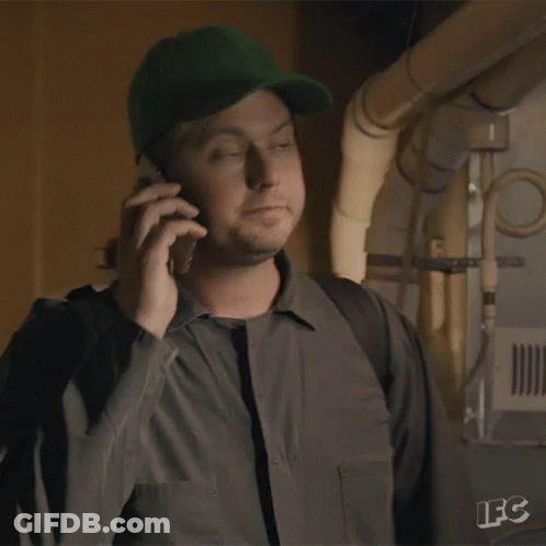 A Man Is Talking On A Cell Phone And Saying I 'M In GIF