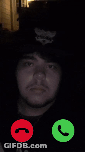 A Man Is Talking On A Cell Phone And The Name John Pork Is Calling GIF
