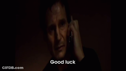 A Man Is Talking On A Cell Phone With The Words Good Luck Written Below Him GIF