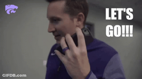 A Man Is Talking On A Cell Phone With The Words Let 'S Go Written On The Bottom GIF