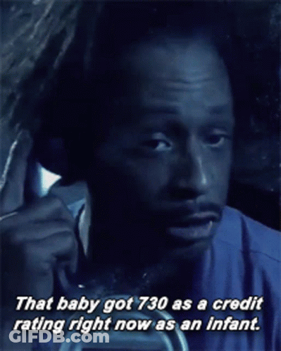 A Man Is Talking On A Phone With The Caption That Baby Got 730 As A Credit Rating Right Now As An Infant GIF