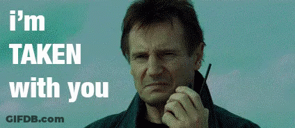 A Man Is Talking On A Walkie Talkie With The Words " I 'M Taken With You " Above Him GIF