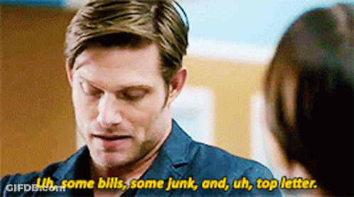 Man Talks To Woman About Bills Junk And Top Letter GIF
