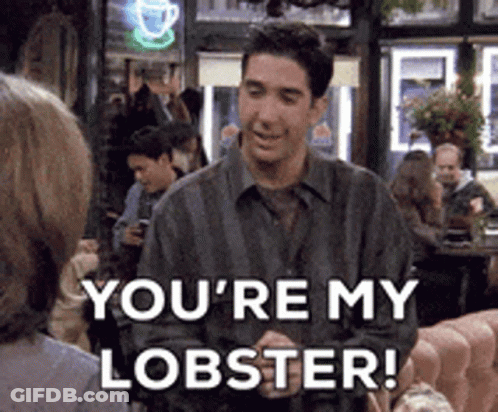 A Man Is Talking To A Woman And Says `` You 'Re My Lobster '' . GIF
