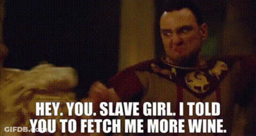 A Man Is Talking To A Woman And Telling Her To Fetch Him More Wine GIF