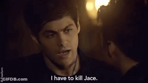 A Man Is Talking To A Woman In A Dark Room And Saying `` I Have To Kill Jace '' . GIF