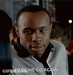 A Man Is Talking To A Woman In A Restaurant And Says `` Here We Go Again '' . GIF