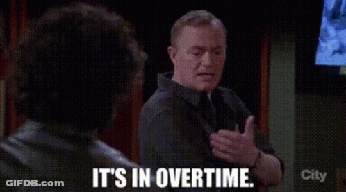 A Man Is Talking To Another Man And Saying `` It 'S In Overtime . '' GIF