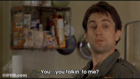 A Man Is Talking To Another Man In A Kitchen And The Words You You Talkin ' To Me Are Visible GIF