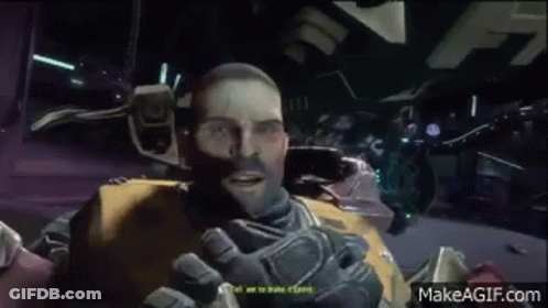 A Man Is Talking To Another Man In A Video Game While Wearing A Helmet . GIF