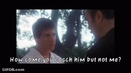 A Man Is Talking To Another Man In Front Of Trees And The Words `` How Come You Coach Him But Not Me '' GIF