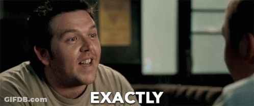 A Man Is Talking To Another Man With Exactly Written On His Face GIF