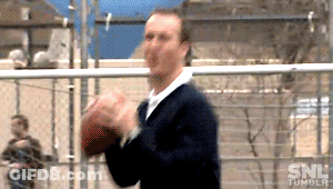 A Man Is Throwing A Football In Front Of A Fence With Snl Tumblr In The Corner GIF