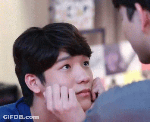 Man Touching Another Man's Face GIF
