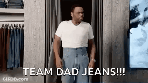 A Man Is Trying On A Pair Of Jeans In A Dressing Room And Says `` Team Dad Jeans '' . GIF