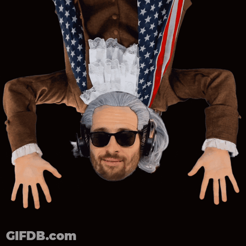 A Man Is Upside Down Wearing Headphones And A Wig GIF