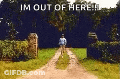 A Man Is Walking Down A Dirt Road With The Words `` I 'M Out Of Here '' . GIF