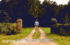 A Man Is Walking Down A Dirt Road With The Words `` Im On My Way ! '' GIF