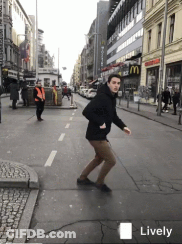 Man Walking Past McDonald's GIF