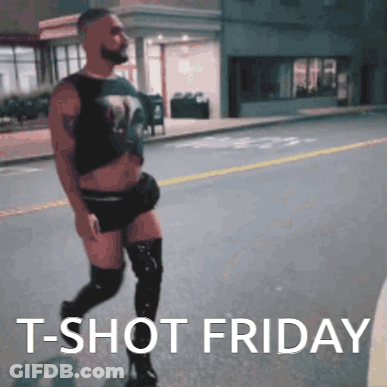 A Man Is Walking Down A Street With The Words " T-Shot Friday " Written Below Him GIF