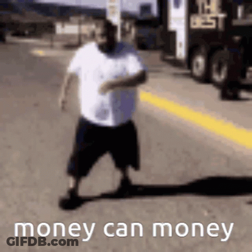 A Man Is Walking Down The Street With The Words `` Money Can Money '' Written On The Bottom . GIF
