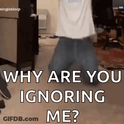 A Man Is Walking In A Room With The Words " Why Are You Ignoring Me " GIF