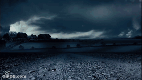 A Man Is Walking In Front Of A Lightning Storm With The Caption Capcut GIF